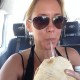 Drinking A Coconut